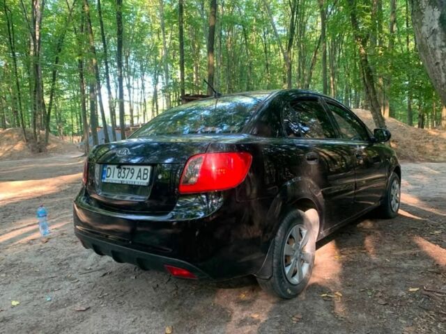 Черный Киа Рио, объемом двигателя 1.4 л и пробегом 270 тыс. км за 4499 $, фото 5 на Automoto.ua