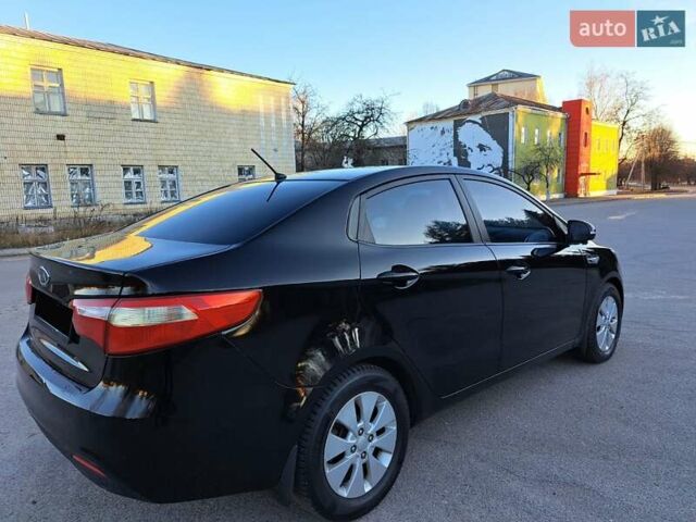 Черный Киа Рио, объемом двигателя 1.59 л и пробегом 231 тыс. км за 7600 $, фото 6 на Automoto.ua