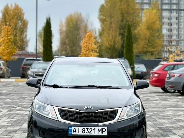 Черный Киа Рио, объемом двигателя 1.4 л и пробегом 180 тыс. км за 5900 $, фото 4 на Automoto.ua