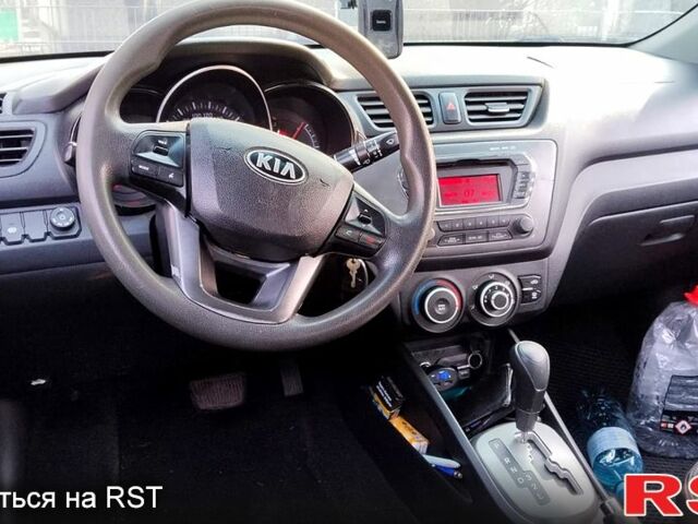 Чорний Кіа Ріо, об'ємом двигуна 1.6 л та пробігом 173 тис. км за 5800 $, фото 2 на Automoto.ua