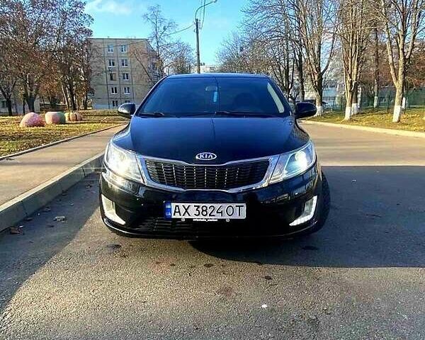 Черный Киа Рио, объемом двигателя 1.4 л и пробегом 1 тыс. км за 7100 $, фото 10 на Automoto.ua