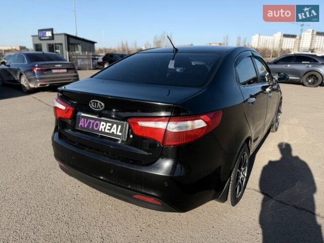 Черный Киа Рио, объемом двигателя 1.4 л и пробегом 162 тыс. км за 7700 $, фото 20 на Automoto.ua