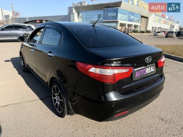 Черный Киа Рио, объемом двигателя 1.4 л и пробегом 162 тыс. км за 7700 $, фото 22 на Automoto.ua