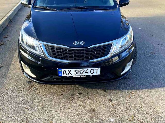 Чорний Кіа Ріо, об'ємом двигуна 1.4 л та пробігом 1350 тис. км за 7100 $, фото 8 на Automoto.ua