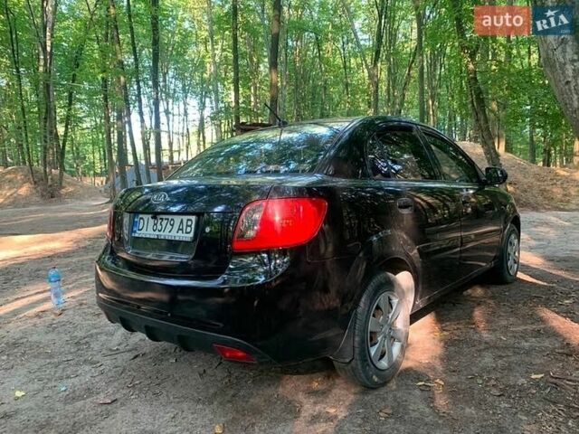 Чорний Кіа Ріо, об'ємом двигуна 1.4 л та пробігом 275 тис. км за 4700 $, фото 4 на Automoto.ua