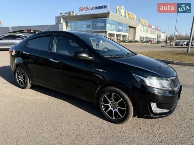 Черный Киа Рио, объемом двигателя 1.4 л и пробегом 162 тыс. км за 7700 $, фото 14 на Automoto.ua