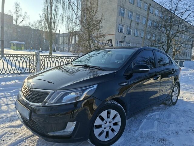 Черный Киа Рио, объемом двигателя 1.6 л и пробегом 231 тыс. км за 7400 $, фото 1 на Automoto.ua