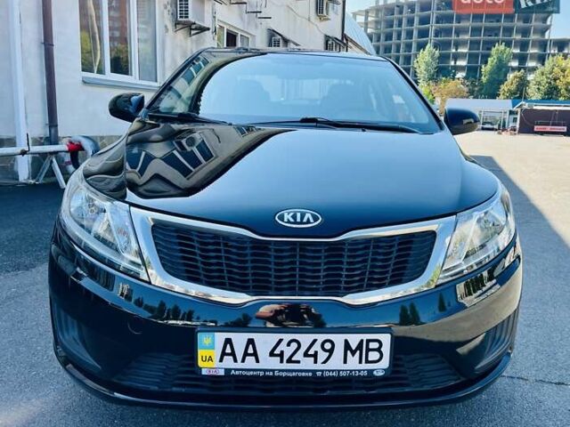 Чорний Кіа Ріо, об'ємом двигуна 1.4 л та пробігом 126 тис. км за 7900 $, фото 7 на Automoto.ua