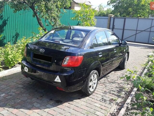 Чорний Кіа Ріо, об'ємом двигуна 1.4 л та пробігом 140 тис. км за 5200 $, фото 1 на Automoto.ua