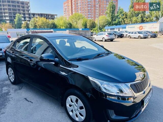 Чорний Кіа Ріо, об'ємом двигуна 1.4 л та пробігом 126 тис. км за 7900 $, фото 6 на Automoto.ua
