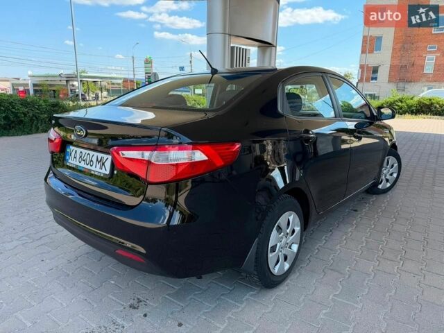 Чорний Кіа Ріо, об'ємом двигуна 1.4 л та пробігом 65 тис. км за 8300 $, фото 13 на Automoto.ua