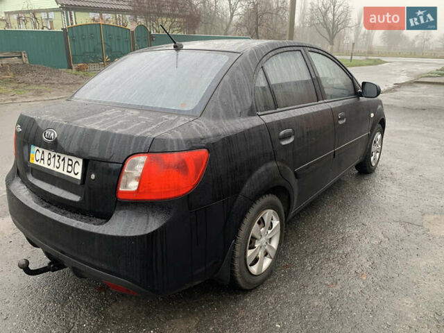 Черный Киа Рио, объемом двигателя 1.4 л и пробегом 105 тыс. км за 4100 $, фото 3 на Automoto.ua
