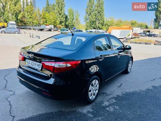 Чорний Кіа Ріо, об'ємом двигуна 1.4 л та пробігом 126 тис. км за 7900 $, фото 4 на Automoto.ua