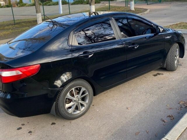 Черный Киа Рио, объемом двигателя 1.4 л и пробегом 135 тыс. км за 6700 $, фото 4 на Automoto.ua
