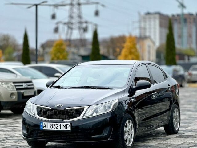 Черный Киа Рио, объемом двигателя 1.4 л и пробегом 180 тыс. км за 5900 $, фото 5 на Automoto.ua