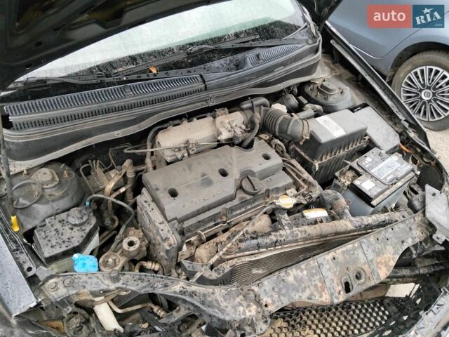 Чорний Кіа Ріо, об'ємом двигуна 1.4 л та пробігом 160 тис. км за 2450 $, фото 5 на Automoto.ua