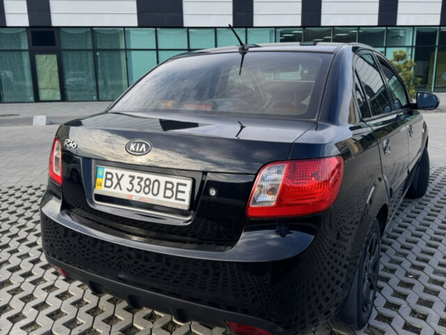 Чорний Кіа Ріо, об'ємом двигуна 1.4 л та пробігом 208 тис. км за 3900 $, фото 6 на Automoto.ua