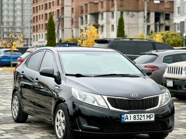 Черный Киа Рио, объемом двигателя 1.4 л и пробегом 180 тыс. км за 5900 $, фото 6 на Automoto.ua