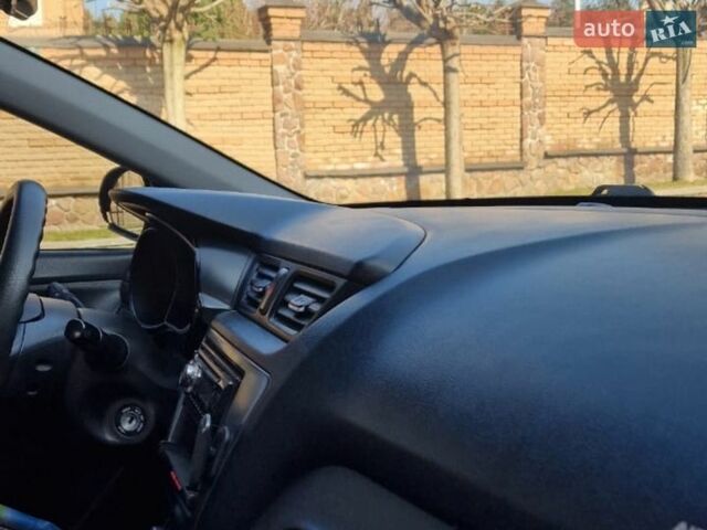 Чорний Кіа Ріо, об'ємом двигуна 1.4 л та пробігом 180 тис. км за 6450 $, фото 2 на Automoto.ua
