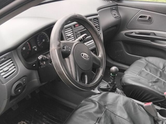 Чорний Кіа Ріо, об'ємом двигуна 1.4 л та пробігом 115 тис. км за 5600 $, фото 3 на Automoto.ua