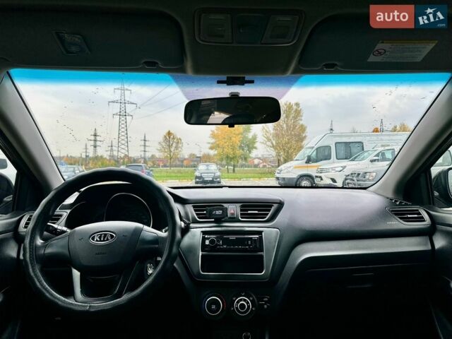 Черный Киа Рио, объемом двигателя 1.4 л и пробегом 180 тыс. км за 5900 $, фото 22 на Automoto.ua