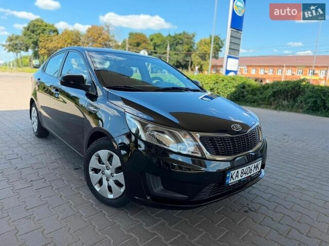 Чорний Кіа Ріо, об'ємом двигуна 1.4 л та пробігом 65 тис. км за 8300 $, фото 12 на Automoto.ua