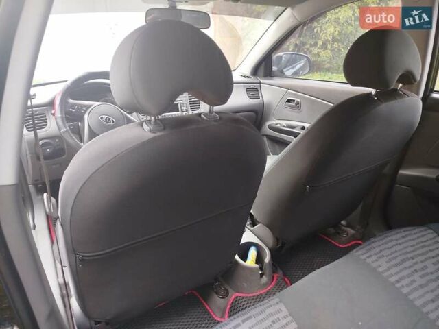 Черный Киа Рио, объемом двигателя 1.4 л и пробегом 133 тыс. км за 5900 $, фото 9 на Automoto.ua