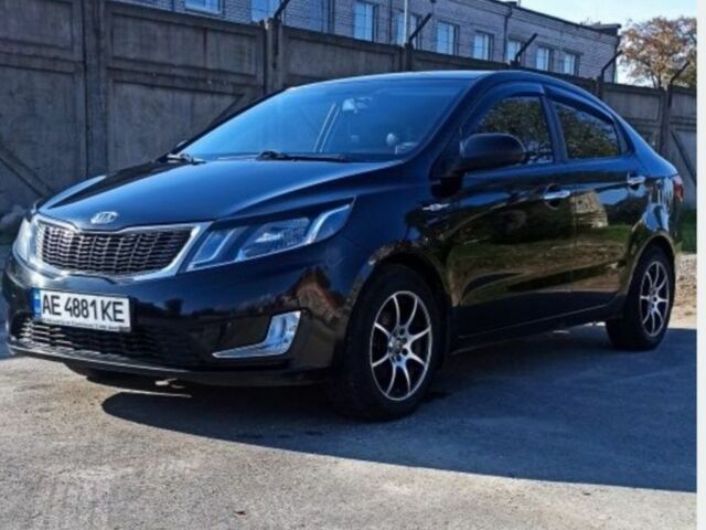 Чорний Кіа Ріо, об'ємом двигуна 1.4 л та пробігом 160 тис. км за 6900 $, фото 2 на Automoto.ua