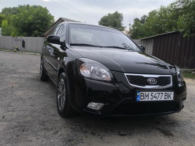 Черный Киа Рио, объемом двигателя 1.4 л и пробегом 137 тыс. км за 6300 $, фото 1 на Automoto.ua