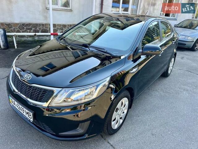 Чорний Кіа Ріо, об'ємом двигуна 1.4 л та пробігом 126 тис. км за 7900 $, фото 8 на Automoto.ua