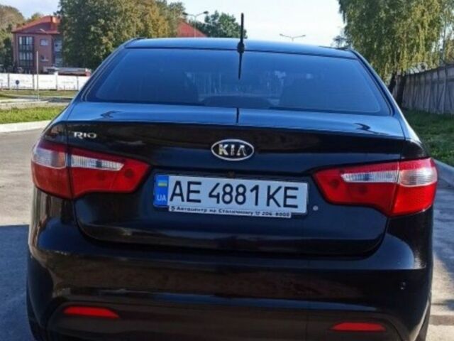 Чорний Кіа Ріо, об'ємом двигуна 1.4 л та пробігом 160 тис. км за 6900 $, фото 1 на Automoto.ua