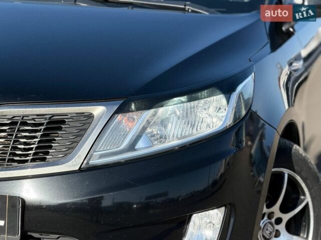 Черный Киа Рио, объемом двигателя 1.4 л и пробегом 162 тыс. км за 7700 $, фото 3 на Automoto.ua