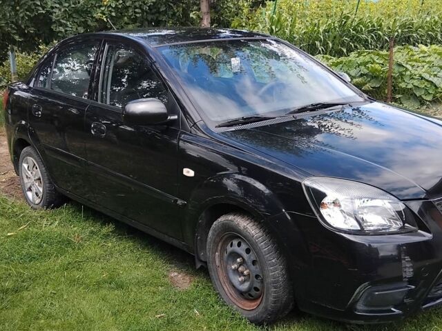 Чорний Кіа Ріо, об'ємом двигуна 1.4 л та пробігом 115 тис. км за 5600 $, фото 5 на Automoto.ua