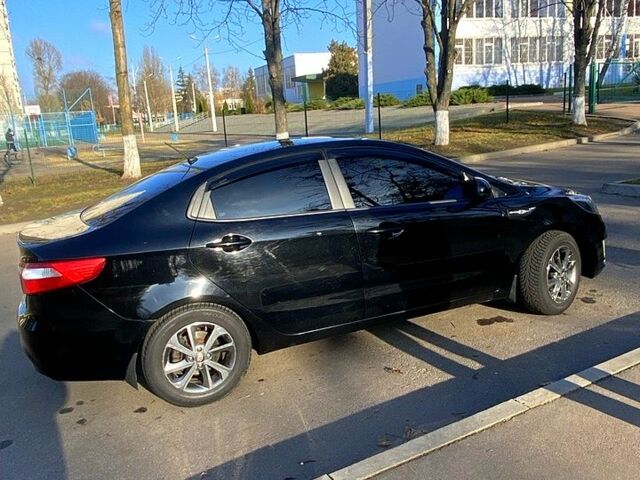 Черный Киа Рио, объемом двигателя 1.4 л и пробегом 135 тыс. км за 7100 $, фото 3 на Automoto.ua