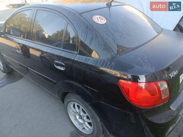Черный Киа Рио, объемом двигателя 1.4 л и пробегом 160 тыс. км за 2600 $, фото 2 на Automoto.ua