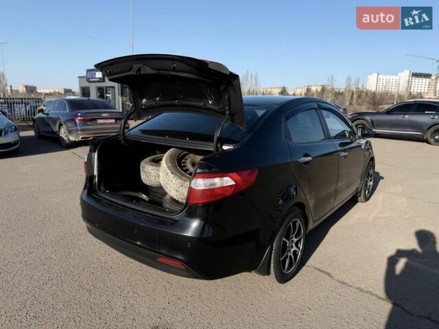 Черный Киа Рио, объемом двигателя 1.4 л и пробегом 162 тыс. км за 7700 $, фото 24 на Automoto.ua