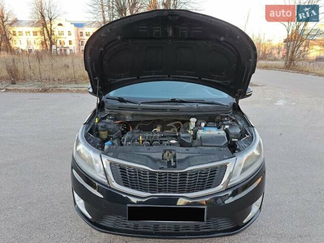 Черный Киа Рио, объемом двигателя 1.59 л и пробегом 231 тыс. км за 7600 $, фото 27 на Automoto.ua