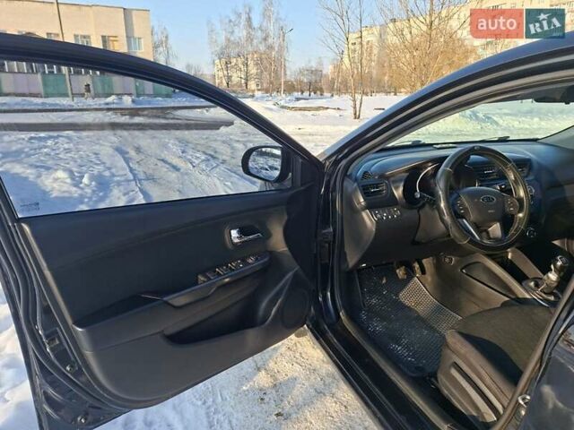 Черный Киа Рио, объемом двигателя 1.59 л и пробегом 231 тыс. км за 7100 $, фото 11 на Automoto.ua