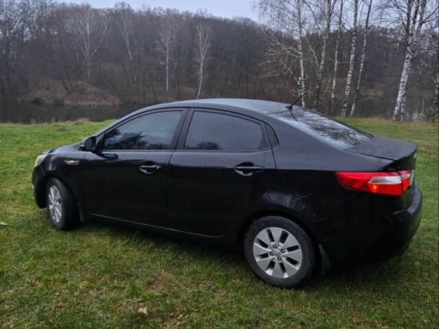 Черный Киа Рио, объемом двигателя 1.6 л и пробегом 231 тыс. км за 5850 $, фото 4 на Automoto.ua