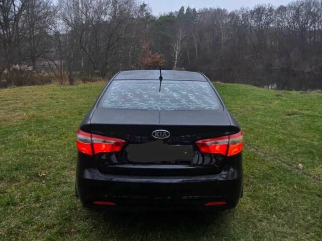 Черный Киа Рио, объемом двигателя 1.6 л и пробегом 231 тыс. км за 5850 $, фото 3 на Automoto.ua