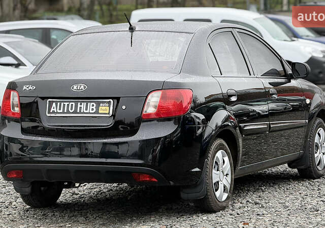 Черный Киа Рио, объемом двигателя 1.4 л и пробегом 100 тыс. км за 5000 $, фото 11 на Automoto.ua