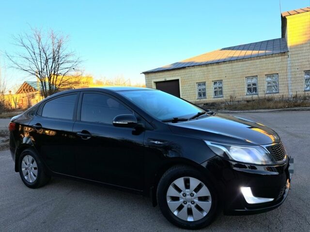 Черный Киа Рио, объемом двигателя 1.6 л и пробегом 231 тыс. км за 7600 $, фото 3 на Automoto.ua