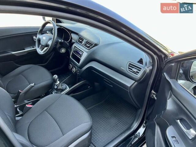 Чорний Кіа Ріо, об'ємом двигуна 1.4 л та пробігом 126 тис. км за 7900 $, фото 28 на Automoto.ua