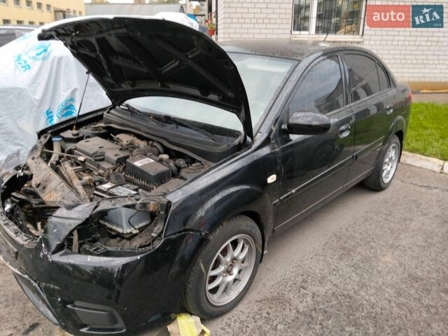 Чорний Кіа Ріо, об'ємом двигуна 1.4 л та пробігом 160 тис. км за 2450 $, фото 3 на Automoto.ua