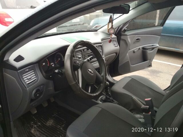 Черный Киа Рио, объемом двигателя 1.4 л и пробегом 25 тыс. км за 7000 $, фото 5 на Automoto.ua