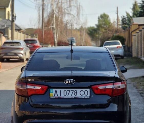Черный Киа Рио, объемом двигателя 1.4 л и пробегом 180 тыс. км за 6500 $, фото 5 на Automoto.ua
