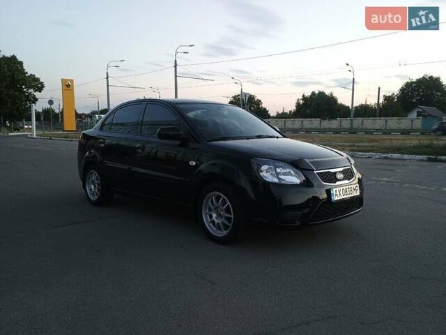 Черный Киа Рио, объемом двигателя 1.4 л и пробегом 150 тыс. км за 4500 $, фото 2 на Automoto.ua