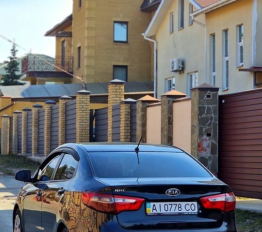 Чорний Кіа Ріо, об'ємом двигуна 1.4 л та пробігом 180 тис. км за 6500 $, фото 2 на Automoto.ua