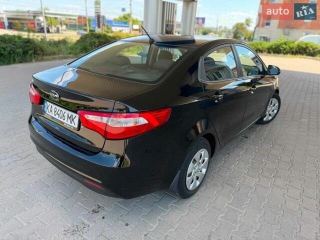Чорний Кіа Ріо, об'ємом двигуна 1.4 л та пробігом 65 тис. км за 8300 $, фото 6 на Automoto.ua