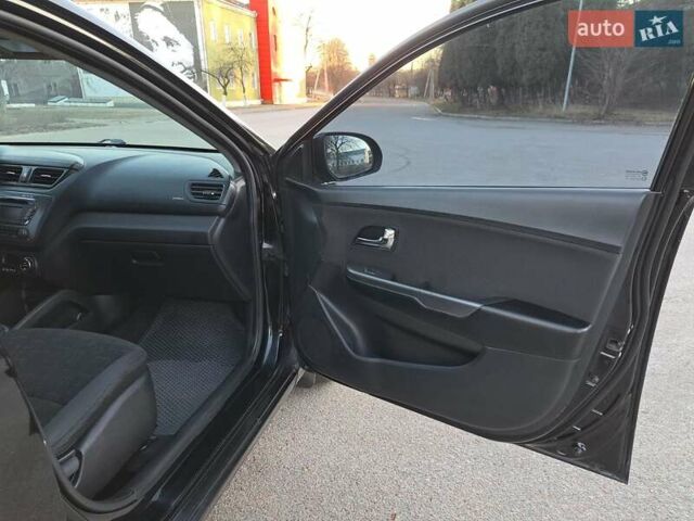 Черный Киа Рио, объемом двигателя 1.59 л и пробегом 231 тыс. км за 7600 $, фото 21 на Automoto.ua